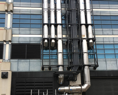 Système d'échappement sur le côté du bâtiment